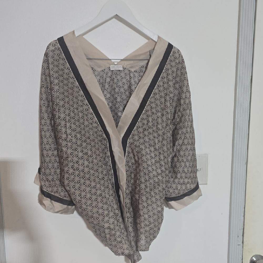 This Brunello Cucinelli Shirt is crafted in Italy from 100% silk.